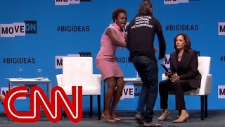 Protester grabs Kamala Harris microphone on stage [upl. by Trumann393]