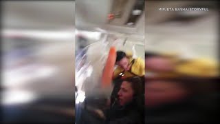 SCARY VIDEO Flight attendant beverage cart smash into ceiling during violent turbulence  ABC7 [upl. by Akirret]