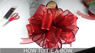 How to Make a Christmas Bow  Easiest BowMaking Method [upl. by Ahc930]